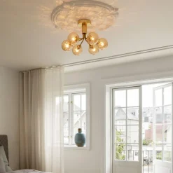 Nuura Apiales 6 taklampe børstet messing / optic gold glass