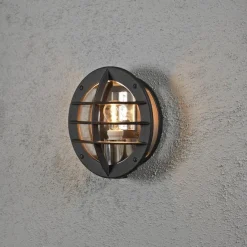 Oden vegglampe utendørs IP23 m/stikkontakt - Svart/klart glass